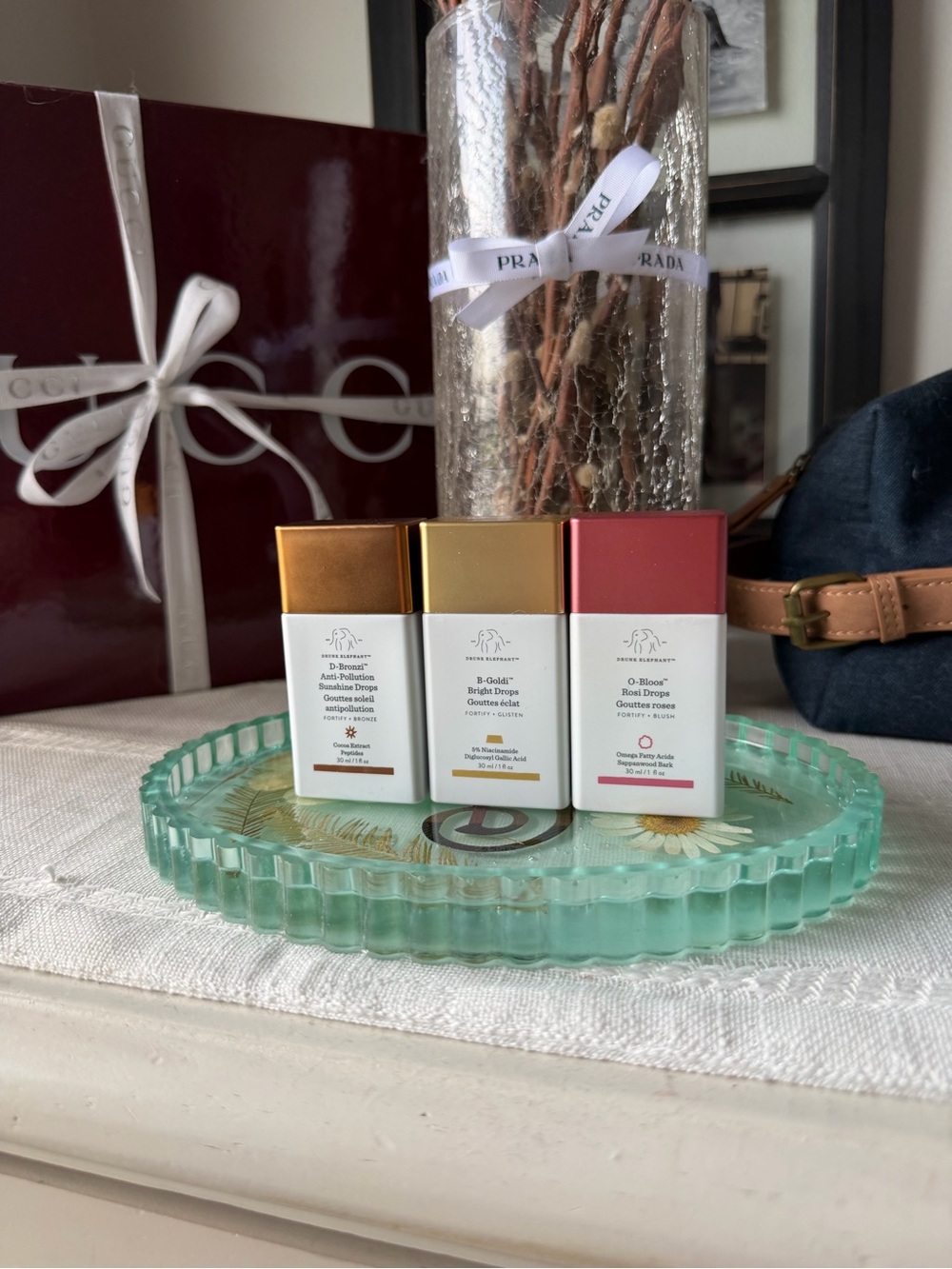 Drunk Elephant Trio with Gold, Bronze, and Rose Caps